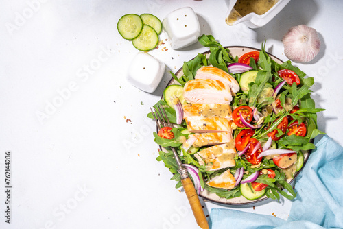 Schilderij op canvas Grilled chicken breast fillet with vegetable salad