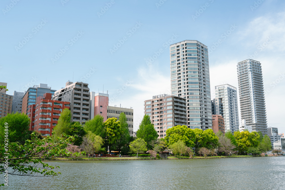 Ueno Park Shinobazu Pond and skyscraper at spring in Tokyo, Japan