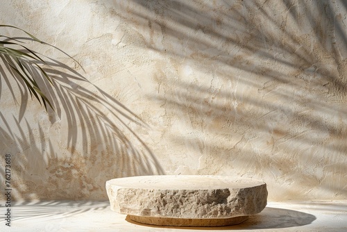 Beige stone podium with palm leaves shadows. Mock up for product, cosmetic presentation. Pedestal, platform for beauty products. Empty scene. Stage, display, showcase. Copy space.