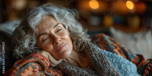 In a serene indoor scene, an elderly Caucasian woman enjoys a peaceful nap on the sofa.