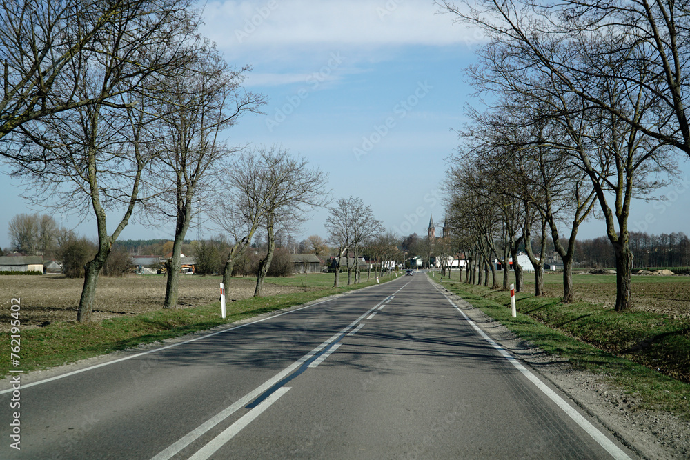 Asphalt road in countryside - driver's perspective