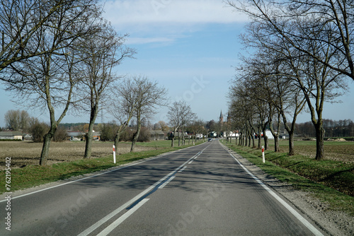 Asphalt road in countryside - driver's perspective