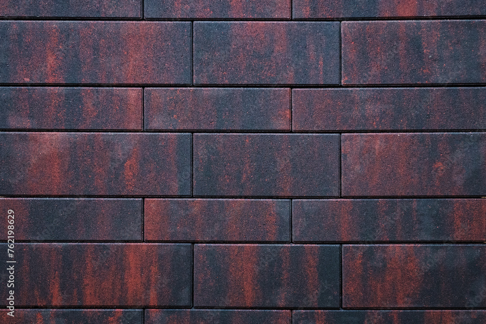 An energetic and vibrant display of concrete block pavement tiles, showcasing a wide spectrum of colors and offering a dynamic and engaging visual aesthetic for outdoor spaces. background An energetic and vibrant display of concrete block pavement tiles, showcasing a wide spectrum of colors and offering a dynamic and engaging visual aesthetic for outdoor spaces. background