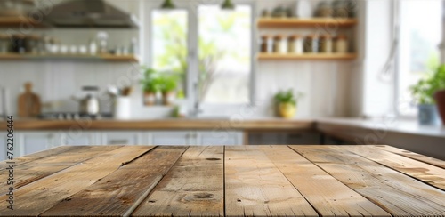 Empty wooden table and blurred background of modern kitchen, product display montage
