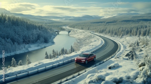 Red Car Driving on Snow Covered Road