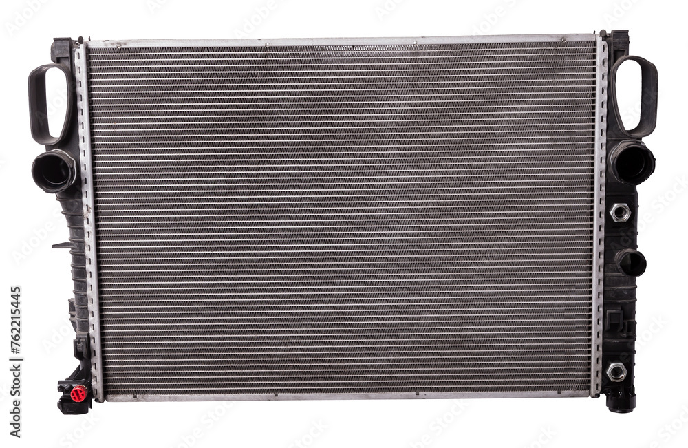 Fototapeta premium The cooling radiator is a metal heat exchanger inside filled with antifreeze. Rubber pipes are connected to it, which are mounted on the corresponding neck of the motor. Repair in the workshop.