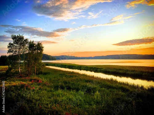 Sunset over the Halikonlahti bay and Halikonjoki river shore near Salo, Finland, July 2018