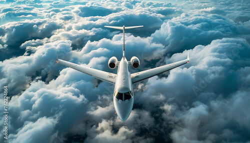 airplane flying over the clouds © The Stock Photo Girl