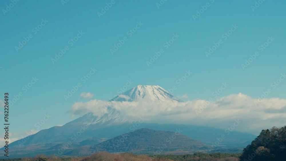 Mount Fuji at lake Shoji near Kawaguchiko, one of the Fuji Five Lakes located in Yamanashi, Japan. Landmark for tourists attraction. Japan Travel, Destination, Vacation and Mount Fuji Day concept Mount Fuji at lake Shoji near Kawaguchiko, one of the Fuji Five Lakes located in Yamanashi, Japan. Landmark for tourists attraction. Japan Travel, Destination, Vacation and Mount Fuji Day concept