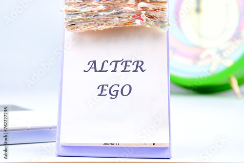 Text Alter ego is translated from Latin as the second self. a real or invented alternative personality of a person. Written on the desktop calendar