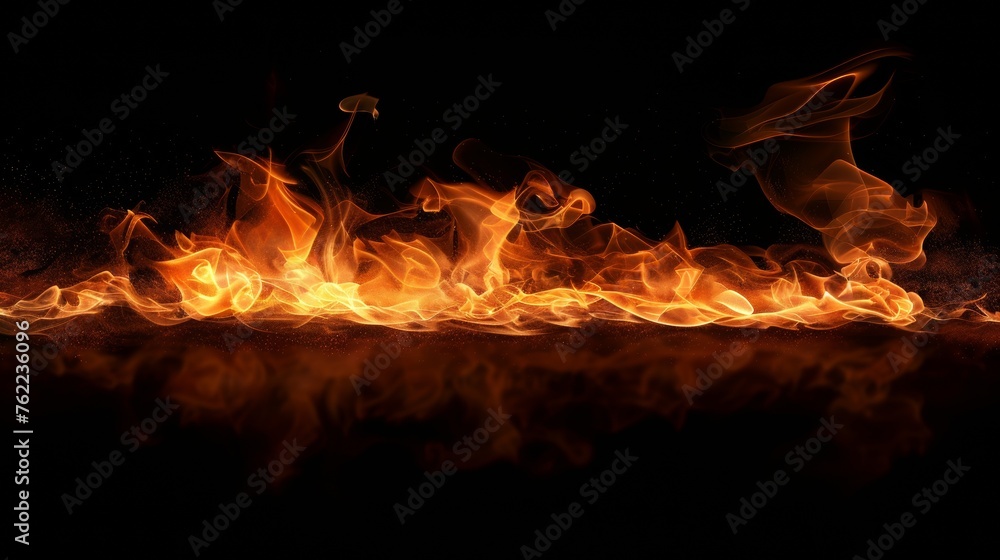 Intense flames of fire captured in motion on a dark background Intense flames of fire captured in motion on a dark background