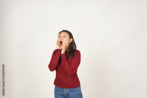 Young Asian woman in Red t-shirt announcement shout advertising isolated on white background