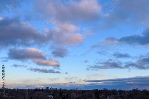Sunrise clouds and city horizon, Canada