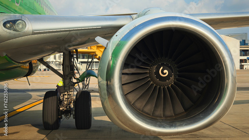Aviation gas turbine engine preparing a cargo plane at the airport. airplane jet engine. aircraft passenger loading area