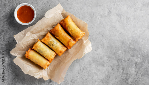 Fried chinese spring rolls. top view of Fried chinese spring rolls on concrete background, copy space photo