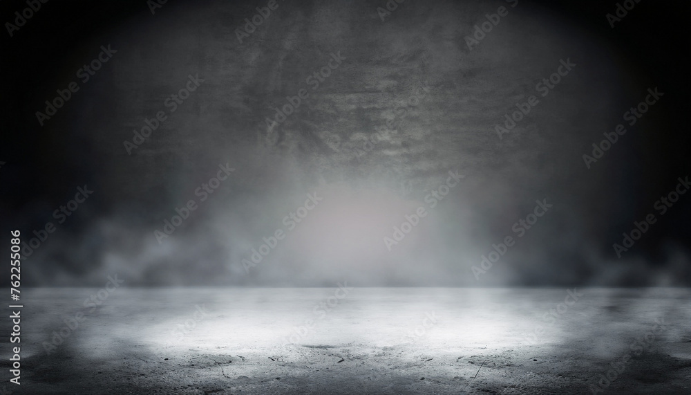 Empty space of Studio dark room concrete floor grunge texture background with spot lighting and fog or mist in background. Empty space of Studio dark room concrete floor grunge texture background with spot lighting and fog or mist in background.