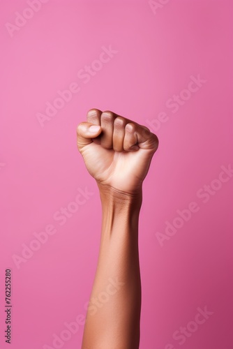 Womans Arm on Pink Background