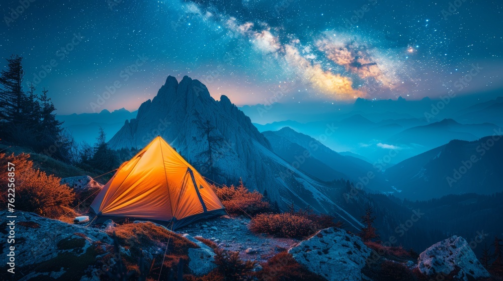 Modern Tent camping mountain under starry sky with milky way View of the serene landscape