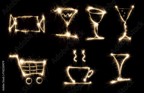 collage of figures with Begal lights, sparks, seven images (candy, glasses, cup, food basket) photo