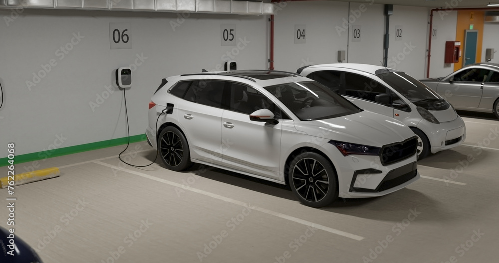 Generic electric crossover car connected to charging box. EV vehicle plugged in energy station, recharge battery at shopping mall or urban city house parking lot. Generic electric crossover car connected to charging box. EV vehicle plugged in energy station, recharge battery at shopping mall or urban city house parking lot.