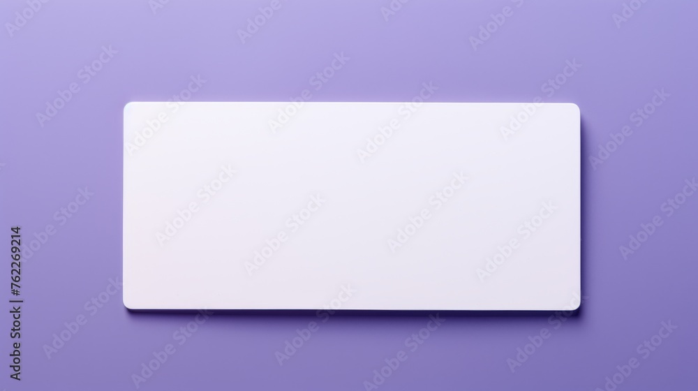 White card against purple wall. Rectangle empty white plate isolated on the purple background. White card against purple wall. Rectangle empty white plate isolated on the purple background.