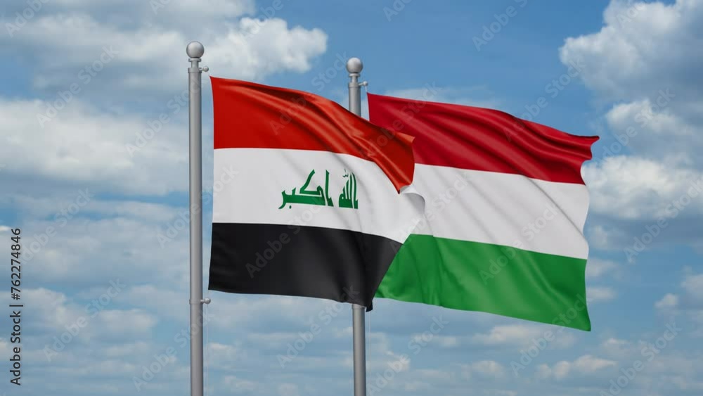 Hungary and Iraq two flags waving together, looped video, two country relations concept Hungary and Iraq two flags waving together, looped video, two country relations concept
