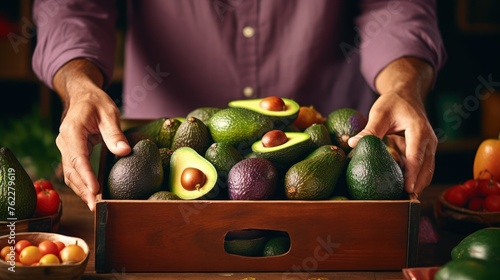 Farmers pack colorful avocados Highest grade, packed in a box, ready to export abroad.