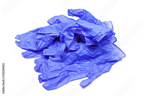 Blue surgical gloves pile isolated on white 