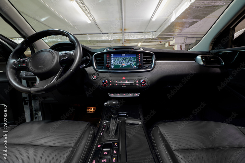 Interior of modern car at underground parking. Interior of modern car at underground parking.
