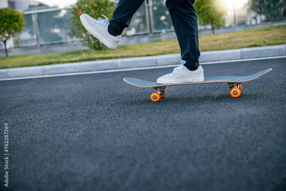 Skateboarder skateboarding outdoors in city Skateboarder skateboarding outdoors in city