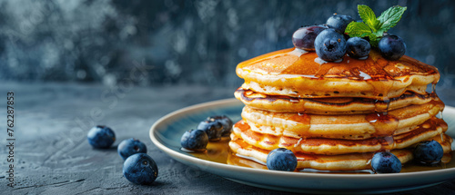 stack of pancakes with berries in a plate © Michael