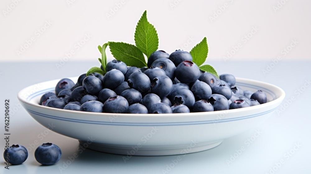 Blueberries were beautifully arranged on plates on the table. Blueberries were beautifully arranged on plates on the table.