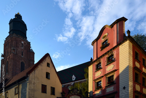 Wroclaw, Poland. Hansel and Gretel - two medieval tenement houses at the north-west corner of the Wrocław market square, connected by an arcade. Archway is symbolic of a couple holding hands photo