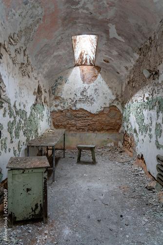 Empty Crumbling Cell Room