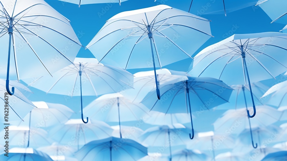 Sleek geometric umbrellas in various shades of blue open against a clear blue sky Aerial view high resolution