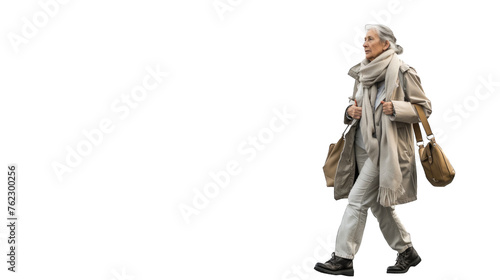 The modern elderly woman walks with a light gait. PNG file of isolated cutout object on transparent background.