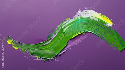 Oil paint brushstroke in green and yellow on purple background.