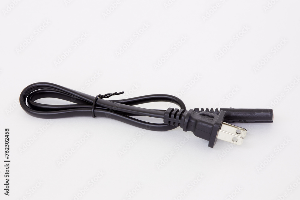 Black power cable on white background. Black power cable on white background.