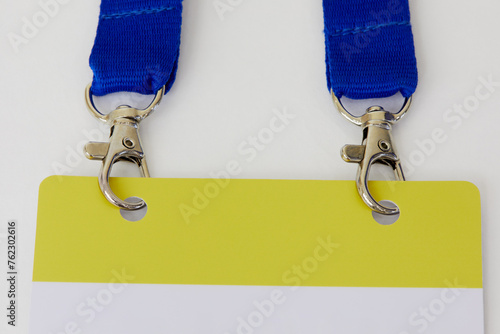 Blank badge on blue belt on white background. photo