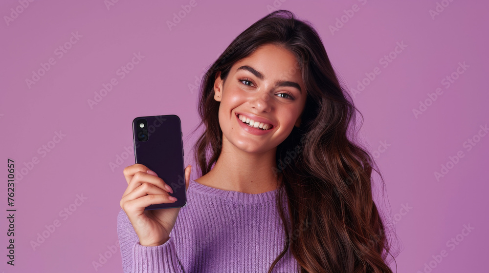 Happy Woman Displaying Mobile Screen with Purple Background
Happy Woman Displaying Mobile Screen with Purple Background