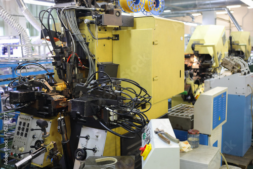 Machine for produce of shoes in modern workshop of shoes factory photo