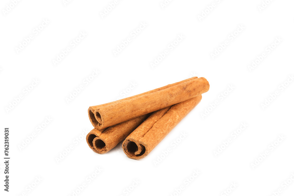 Cinnamon sticks isolated on white background. Cinnamon roll. Spicy spice for baking, desserts and drinks. Fragrant ground cinnamon. Cinnamon sticks isolated on white background. Cinnamon roll. Spicy spice for baking, desserts and drinks. Fragrant ground cinnamon.