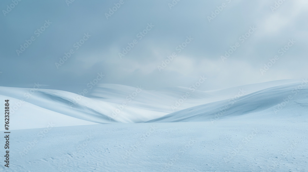 Serene Winter Landscape: Pristine Snowy Dunes under a Subtle Sky