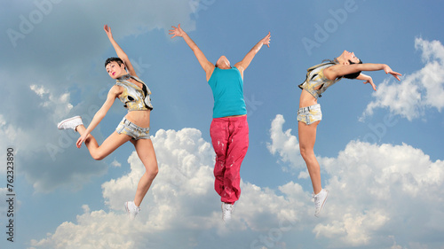 Three dancing and jumping women in clouds, collage with one model photo