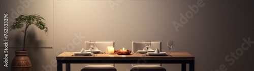 Minimalist still life of a dining table with two place settings and a candle in the center.