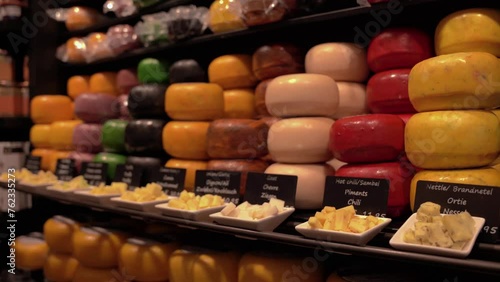 Gouda, the Nehterlands, March 27 2023: Display of traditional Dutch cheese at local cheese shop in Gouda, the Netherlands 4k
