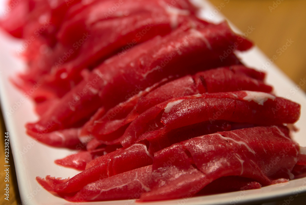The slices of beef for shabu-shabu The slices of beef for shabu-shabu