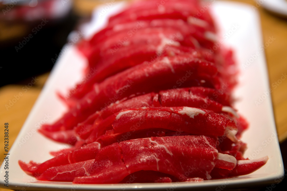 The slices of beef for shabu-shabu The slices of beef for shabu-shabu