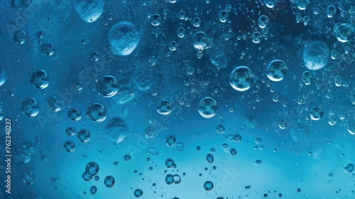 Wallpaper Mural Close-up of water bubbles on a blue background. Suitable for science or nature themes Torontodigital.ca