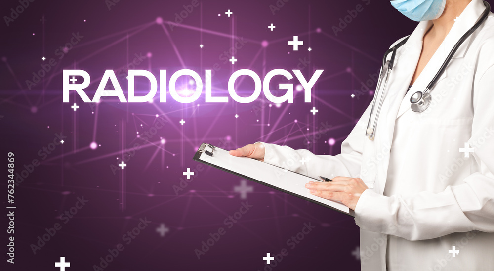 Doctor fills out medical record Doctor fills out medical record